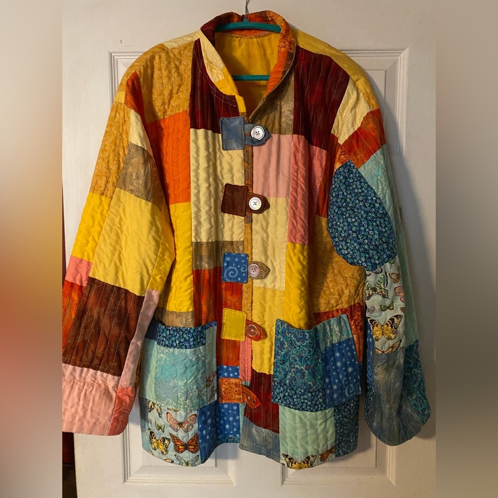 Unique vintage hand sewn quilt jacket.